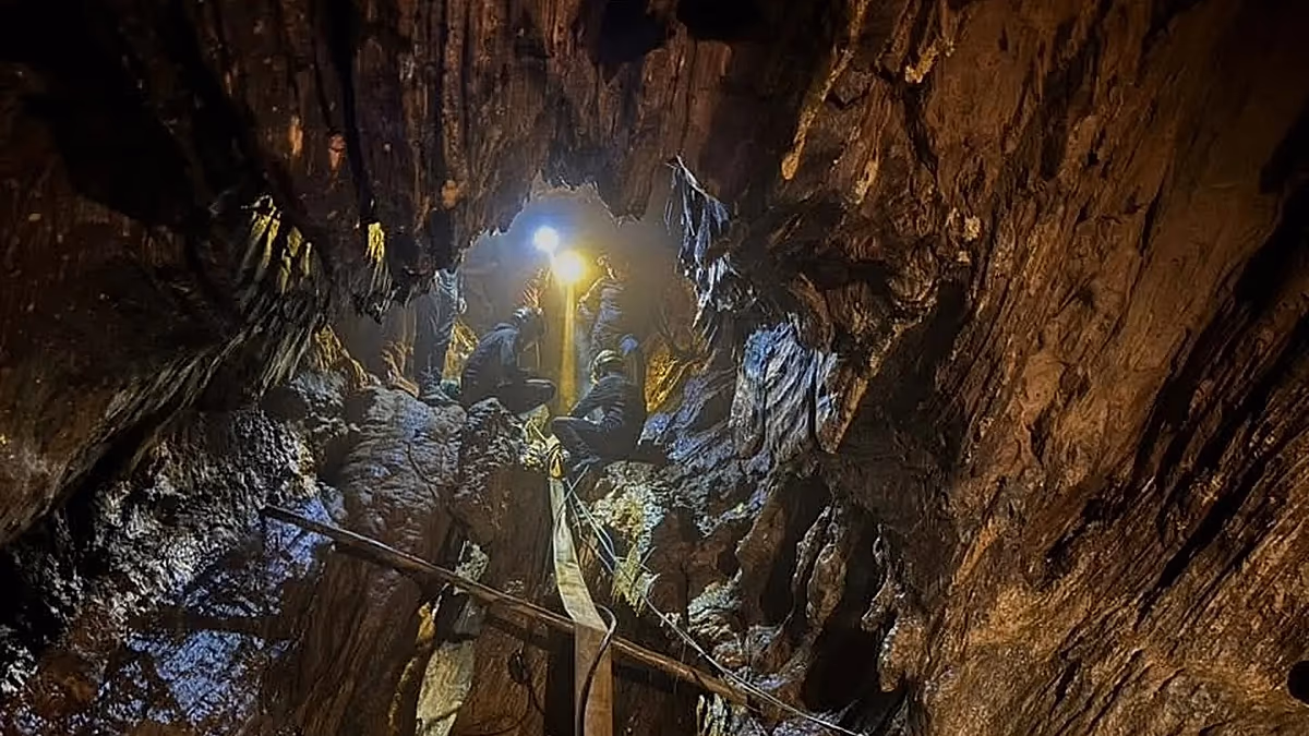 Rescuers search for alternative route to reach two missing in flooded Laos cave